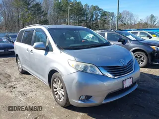 2012 Toyota Sienna XLE AAS with VIN 5TDYK3DC7CS277944, listed as a IAAI auction lot 41311855 with 224,239 mi miles. Bid and sale history available at carsss.com. Image 1.