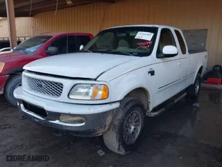 1998 Ford F-150 Standard with VIN 1FTZX18W5WNB68293, listed as a IAAI auction lot 41403989 with 217,473 mi miles. Bid and sale history available at carsss.com. Image 2.