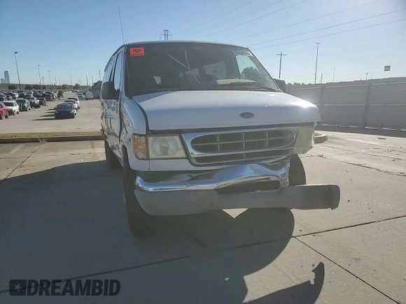 2002 Ford Econoline Passenger XL with VIN 1FBSS31S82HB36096, listed as a Copart auction lot 80654574 with 170,656 mi miles and Salvage title. Bid and sale history available at DreamBid. Image 11.