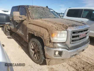 2015 GMC Sierra 1500 SLT with VIN 3GTU2VEJ0FG384652, listed as a Copart auction lot 83015254 with 179,759 mi miles and Salvage Title. Bid and sale history available at DreamBid. Image 4.