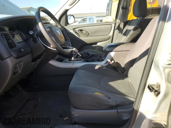 2005 Mazda Tribute i with VIN 4F2YZ92Z85KM06161, listed as a Copart auction lot 75021414 with 171,167 mi miles and Salvage Title. Bid and sale history available at carsss.com. Image 7.