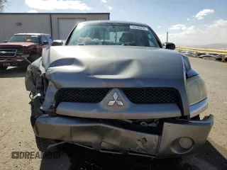2008 Mitsubishi Raider LS z VIN 1Z7HT28KX8S620516, wystawiony jako Copart lot #76298034 z przebiegiem 185 938 mil mil oraz Szkoda całkowita • Salvage title. Historia ofert i sprzedaży dostępna na DreamBid. Obrazek 5.