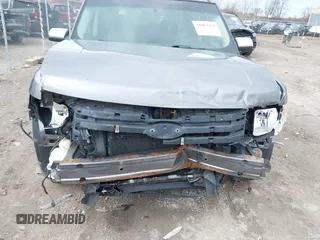 2009 Ford Flex SEL z VIN 2FMDK52CX9BA27679, wystawiony jako IAAI lot #41863371 z przebiegiem 170 993 mil mil oraz . Historia ofert i sprzedaży dostępna na DreamBid. Obrazek 6.