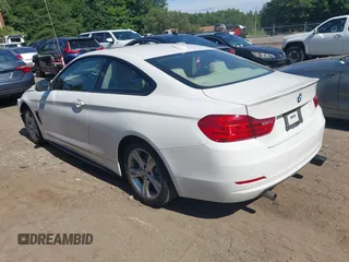 2015 BMW 4 Series 428i xDrive with VIN WBA3N9C52FK248223, listed as a IAAI auction lot 42668268 with 151,390 mi miles and . Bid and sale history available at DreamBid. Image 3.