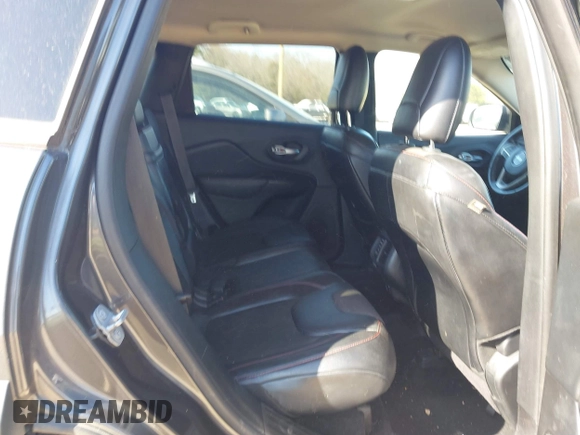 2014 Jeep Cherokee Trailhawk with VIN 1C4PJMBS6EW278987, listed as a IAAI auction lot 41789868 with 136,696 mi miles. Bid and sale history available at carsss.com. Image 8.
