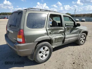 2002 Mazda Tribute LX with VIN 4F2YU09122KM62196, listed as a Copart auction lot 77327034 with 256,385 mi miles and Salvage Title. Bid and sale history available at carsss.com. Image 3.