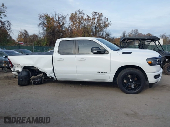 2022 Ram 1500 Big Horn z VIN 1C6SRFBT7NN375197, wystawiony jako IAAI lot #40824095 z przebiegiem 91 751 mil mil oraz . Historia ofert i sprzedaży dostępna na DreamBid. Obrazek 13.