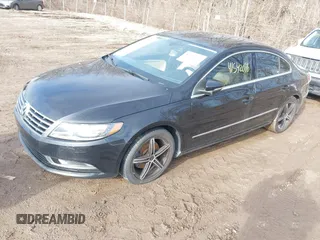 2014 Volkswagen CC Sport with VIN WVWBP7AN4EE534247, listed as a IAAI auction lot 41542076 with 119,199 mi miles and . Bid and sale history available at DreamBid. Image 2.