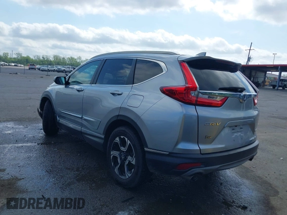 2018 Honda CR-V Touring with VIN 7FARW1H90JE012526, listed as a IAAI auction lot 42055078 with 96,098 mi miles and . Bid and sale history available at DreamBid. Image 3.