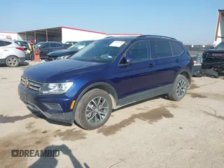 2021 Volkswagen Tiguan S with VIN 3VV1B7AXXMM012292, listed as a IAAI auction lot 41776309 with 109,369 mi miles and . Bid and sale history available at DreamBid. Image 2.