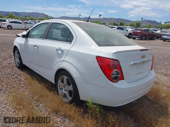 2014 Chevrolet Sonic LTZ with VIN 1G1JE5SB4E4227749, listed as a IAAI auction lot 38965556 with 69,550 mi miles. Bid and sale history available at carsss.com. Image 3.