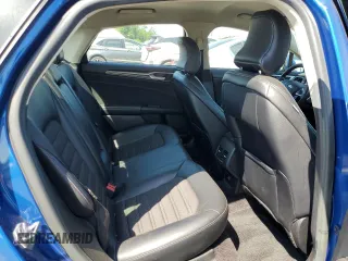 2017 Ford Fusion SE z VIN 3FA6P0T9XHR303675, wystawiony jako Copart lot #57134985 z przebiegiem 130 964 mil mil oraz Tytuł czysty. Historia ofert i sprzedaży dostępna na DreamBid. Obrazek 10.