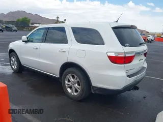 2013 Dodge Durango SXT with VIN 1C4RDJAG7DC659050, listed as a IAAI auction lot 42637236 with 162,458 mi miles and . Bid and sale history available at DreamBid. Image 3.