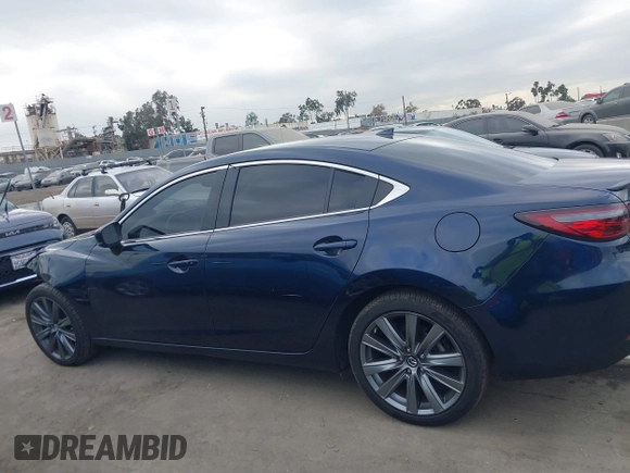2018 Mazda 6 Grand Touring with VIN JM1GL1TY3J1334600, listed as a IAAI auction lot 41060893 with 64,852 mi miles and . Bid and sale history available at DreamBid. Image 15.