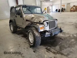 2004 Jeep Wrangler Rubicon z VIN 1J4FA69S44P784141, wystawiony jako Copart lot #55235305 z przebiegiem 125 564 mil mil oraz Szkoda całkowita • Salvage title. Historia ofert i sprzedaży dostępna na DreamBid. Obrazek 14.