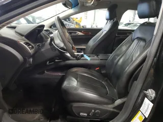 2014 Lincoln MKZ z VIN 3LN6L2JKXER819971, wystawiony jako Copart lot #49979115 z przebiegiem 132 602 mil mil oraz Szkoda całkowita • Salvage title. Historia ofert i sprzedaży dostępna na DreamBid. Obrazek 7.