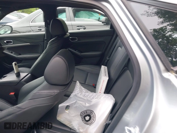 2023 Acura Integra w/A-Spec Package z VIN 19UDE4H38PA016008, wystawiony jako IAAI lot #42320878 z przebiegiem 32 129 mil mil oraz . Historia ofert i sprzedaży dostępna na DreamBid. Obrazek 8.