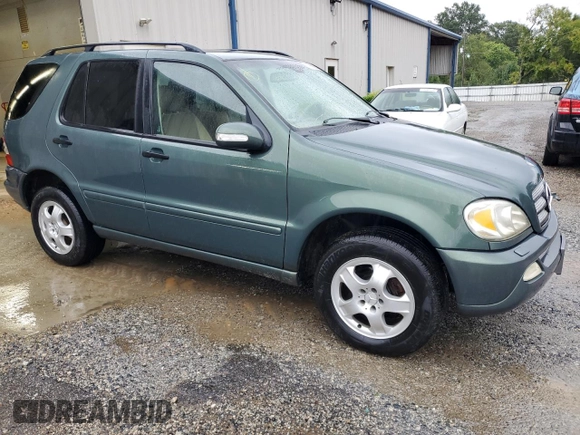 2002 Mercedes-Benz M-Class with VIN 4JGAB54EX2A313793, listed as a Copart auction lot 72600614 with 140,053 mi miles and Salvage Title. Bid and sale history available at carsss.com. Image 4.