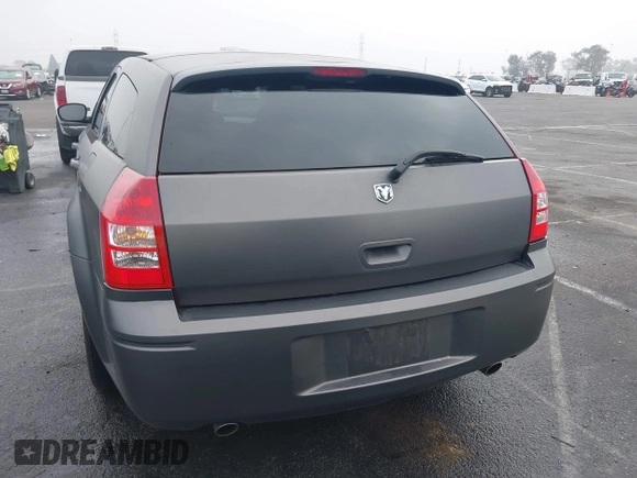 2005 Dodge Magnum RT with VIN 2D4GV58265H500284, listed as a IAAI auction lot 41194672 with 104,894 mi miles. Bid and sale history available at carsss.com. Image 16.