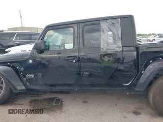 2023 Jeep Gladiator Overland z VIN 1C6HJTFG2PL523686, wystawiony jako IAAI lot #42134627 z przebiegiem 33 575 mil mil oraz . Historia ofert i sprzedaży dostępna na DreamBid. Obrazek 14.