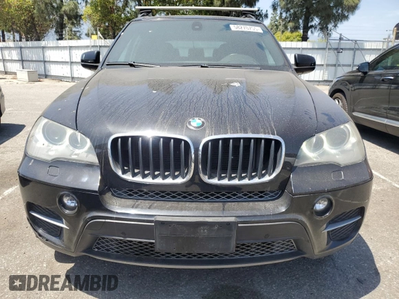 2012 BMW X5 35i z VIN 5UXZV4C51CL744313, wystawiony jako Copart lot #58270755 z przebiegiem 97 903 mil mil oraz Szkoda całkowita • Salvage title. Historia ofert i sprzedaży dostępna na DreamBid. Obrazek 5.