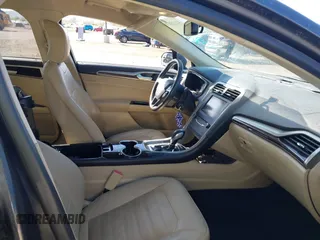 2015 Ford Fusion SE with VIN 3FA6P0HD2FR170310, listed as a IAAI auction lot 42123839 with 127,868 mi miles and . Bid and sale history available at DreamBid. Image 5.