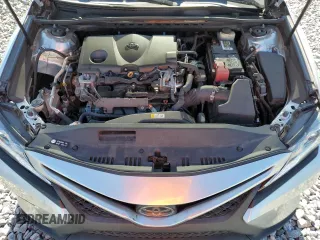 2018 Toyota Camry LE z VIN 4T1B11HK4JU053856, wystawiony jako Copart lot #61017095 z przebiegiem 134 977 mil mil oraz Szkoda całkowita • Salvage title. Historia ofert i sprzedaży dostępna na DreamBid. Obrazek 11.