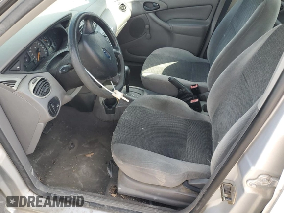 2003 Ford Focus LX с VIN 1FAFP33P63W187283, выставлен на аукционе Copart как лот 48803575 с пробегом Не указан миль и Списание • Salvage title. История ставок и продаж доступна на DreamBid. Изображение 7.