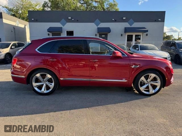 2017 Bentley Bentayga W12 z VIN SJAAC2ZV1HC014037, wystawiony jako Copart lot #54799655 z przebiegiem 36 099 mil mil oraz Szkody całkowita. Historia ofert i sprzedaży dostępna na DreamBid. Obrazek 13.