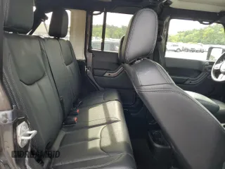 2018 Jeep Wrangler Unlimited Sahara with VIN 1C4BJWEG8JL821569, listed as a Copart auction lot 57949745 with 40,048 mi miles and Salvage title. Bid and sale history available at DreamBid. Image 11.