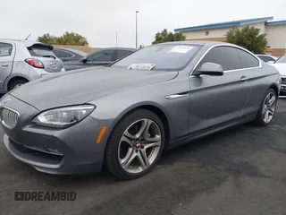 2013 BMW 6 Series 650i with VIN WBAYM9C53DDW20145, listed as a IAAI auction lot 42039618 with 66,684 mi miles and . Bid and sale history available at carsss.com. Image 19.