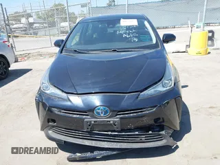 2020 Toyota Prius L Eco z VIN JTDKARFU1L3117772, wystawiony jako IAAI lot #40077005 z przebiegiem 71 892 mil mil oraz . Historia ofert i sprzedaży dostępna na DreamBid. Obrazek 12.