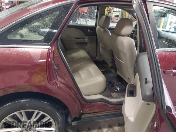 2008 Ford Taurus Limited with VIN 1FAHP28W28G153930, listed as a IAAI auction lot 42154827 with 243,386 mi miles. Bid and sale history available at carsss.com. Image 8.