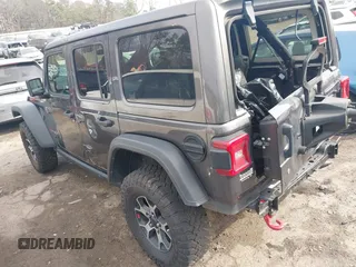2020 Jeep Wrangler Unlimited Rubicon z VIN 1C4HJXFN8LW176002, wystawiony jako IAAI lot #41662158 z przebiegiem 55 924 mil mil oraz . Historia ofert i sprzedaży dostępna na DreamBid. Obrazek 3.