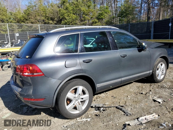 2012 Volkswagen Touareg Lux с VIN WVGEK9BP1CD008132, выставлен на аукционе Copart как лот 49501765 с пробегом 156 594 миль миль и Списание • Salvage title. История ставок и продаж доступна на DreamBid. Изображение 3.