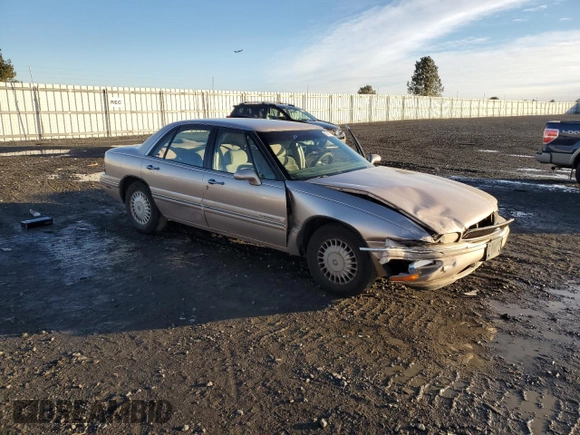 1999 Buick LeSabre Limited with VIN 1G4HR52KXXH452758, listed as a Copart auction lot 85077744 with 211,060 mi miles and Salvage Title. Bid and sale history available at DreamBid. Image 4.