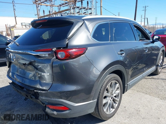 2017 Mazda CX-9 Signature z VIN JM3TCBEY2H0131030, wystawiony jako IAAI lot #41644367 z przebiegiem 193 231 mil mil oraz . Historia ofert i sprzedaży dostępna na DreamBid. Obrazek 4.