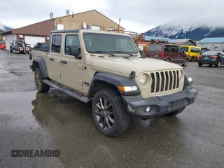 2020 Jeep Gladiator Sport S z VIN 1C6JJTAG0LL207187, wystawiony jako IAAI lot #41559361 z przebiegiem 36 236 mil mil oraz . Historia ofert i sprzedaży dostępna na DreamBid. Obrazek 1.