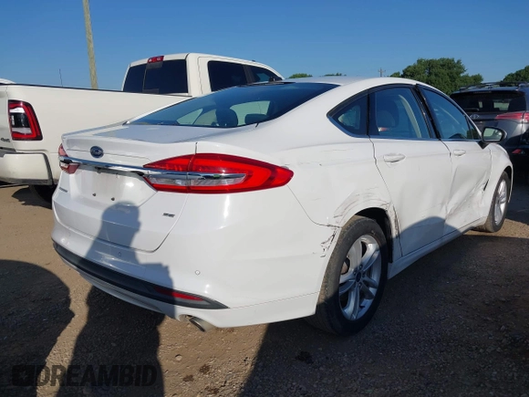 2018 Ford Fusion SE with VIN 3FA6P0H70JR250014, listed as a IAAI auction lot 41990580 with 121,628 mi miles. Bid and sale history available at carsss.com. Image 4.