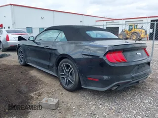 2021 Ford Mustang EcoBoost z VIN 1FATP8UH2M5120226, wystawiony jako IAAI lot #42164009 z przebiegiem 85 571 mil mil oraz . Historia ofert i sprzedaży dostępna na DreamBid. Obrazek 3.
