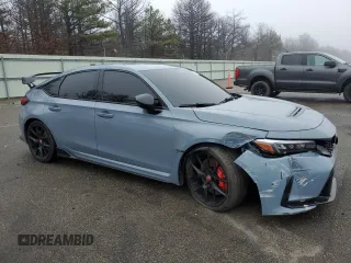 2023 Honda Civic Type R z VIN JHMFL5G40PX003732, wystawiony jako Copart lot #51764935 z przebiegiem 7040 mil mil oraz Szkody całkowita. Historia ofert i sprzedaży dostępna na DreamBid. Obrazek 4.