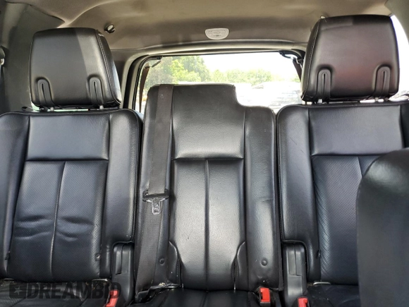 2013 Ford Expedition Limited z VIN 1FMJU2A50DEF11632, wystawiony jako Copart lot #55976345 z przebiegiem 176 168 mil mil oraz Szkoda całkowita • Salvage title. Historia ofert i sprzedaży dostępna na DreamBid. Obrazek 10.