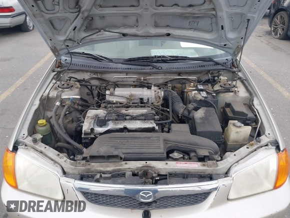 2000 Mazda Protege DX with VIN JM1BJ2227Y0237323, listed as a IAAI auction lot 42179683 with Not Provided miles and . Bid and sale history available at DreamBid. Image 10.