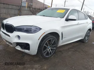2018 BMW X6 xDrive35i z VIN 5UXKU2C52J0X51312, wystawiony jako IAAI lot #41837606 z przebiegiem 148 722 mil mil oraz . Historia ofert i sprzedaży dostępna na DreamBid. Obrazek 2.