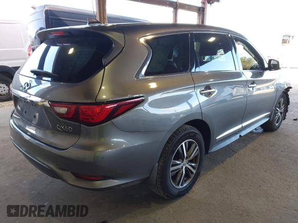 2019 Infiniti QX60 Luxe with VIN 5N1DL0MM8KC558679, listed as a IAAI auction lot 41973649 with 51,867 mi miles and . Bid and sale history available at DreamBid. Image 4.