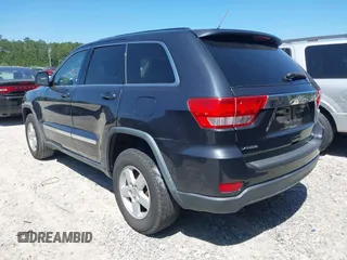 2012 Jeep Grand Cherokee Laredo with VIN 1C4RJEAG9CC223167, listed as a IAAI auction lot 42136098 with 152,715 mi miles. Bid and sale history available at carsss.com. Image 3.