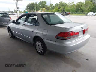2001 Honda Accord LX with VIN 1HGCG55401A063548, listed as a IAAI auction lot 42651792 with 215,058 mi miles and . Bid and sale history available at DreamBid. Image 3.
