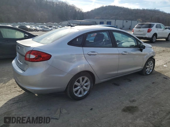 2012 Ford Fiesta SE with VIN 3FADP4BJ9CM121045, listed as a Copart auction lot 47297575 with 83,785 mi miles and Salvage Title. Bid and sale history available at DreamBid. Image 3.
