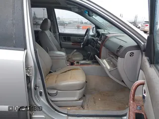 2004 Kia Sorento LX with VIN KNDJC733945239632, listed as a IAAI auction lot 41094685 with 150,838 mi miles. Bid and sale history available at carsss.com. Image 5.