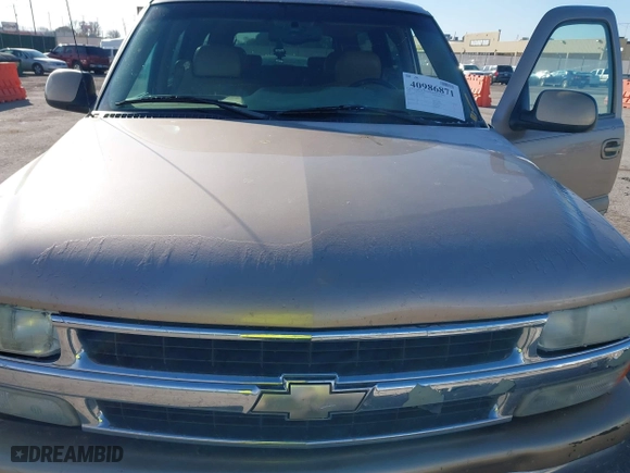 2000 Chevrolet Suburban LS with VIN 3GNEC16T5YG144176, listed as a IAAI auction lot 40986871 with 1 mi miles. Bid and sale history available at carsss.com. Image 10.